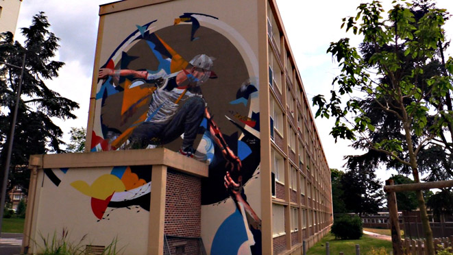 Immeuble Jumièges -  Le graffeur Arnaud Liard symbolise le lien créé entre les différents quartiers - © JL Corgier